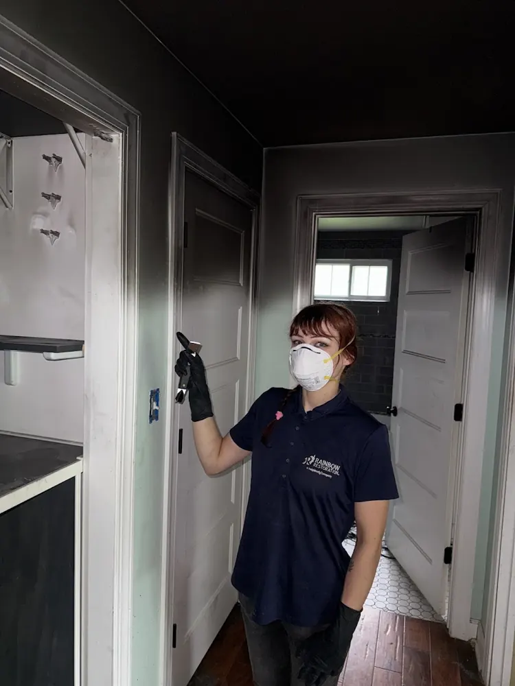 TipTop Beach technician in protective gear on a job in Huntington Beach